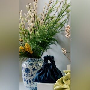 A Bronze Age Halo bag in navy